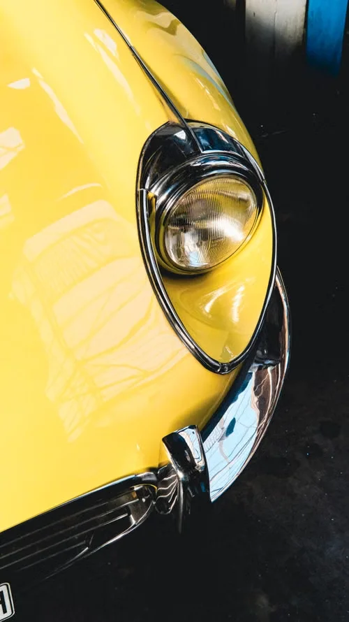 Yellow car after professional detailing